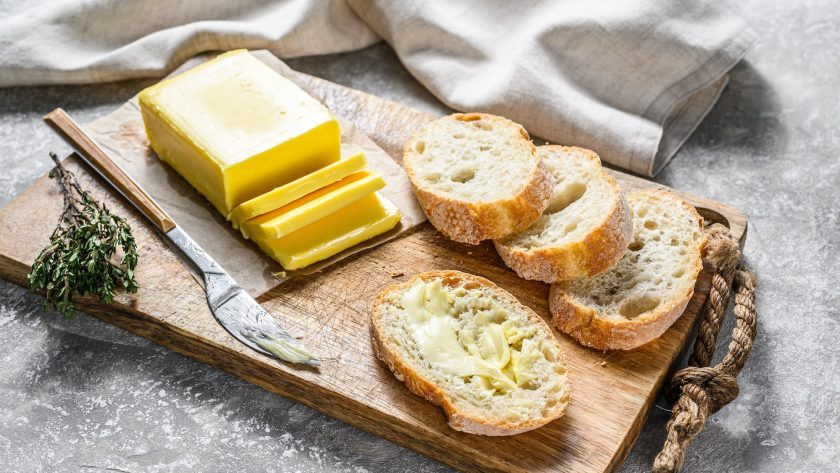 Farm butter and fresh baguette with butter.