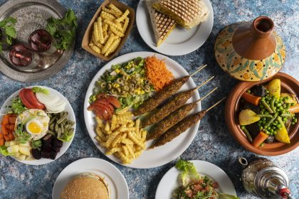 Top view of delicious Moroccan cuisine dishes